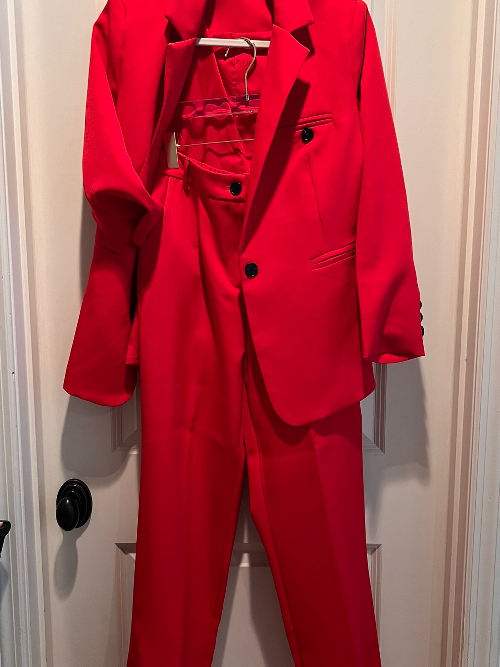 Women’s red pant suit. Size M (8-10) elastic back of pant